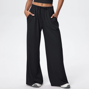 Detail of high waist drawstring elastic waistband on black wide leg lounge pants
