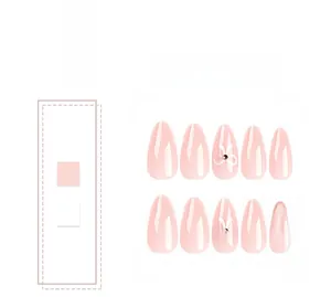 Detailed view of almond-shaped pink press-on nails with 3D white bows and tiny crystals