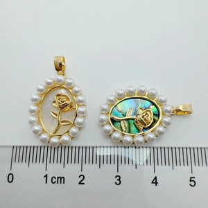 Size reference of baroque 18K gold rose charms with white shell and abalone inlay