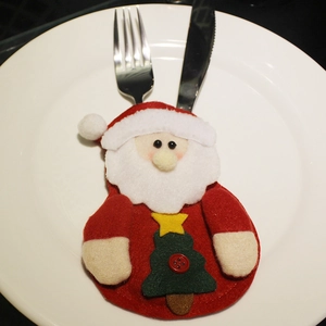 Santa Claus cutlery holder for festive Christmas table decorations