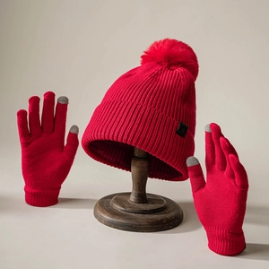 Winter red knitted beanie with faux fur pom and touchscreen gloves two-piece set