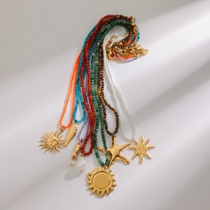 Multilayer stainless steel beaded necklace with gold sun and starfish charms
