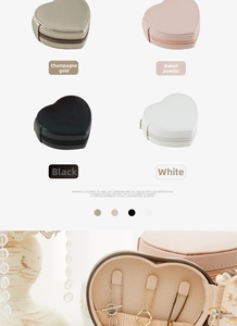 Detail view of heart-shaped PU leather jewelry box with necklace hooks and metal zipper