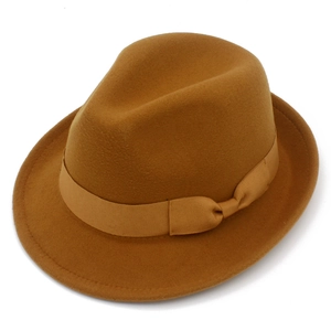 Detail of wool felt fedora hat featuring a matching ribbon bow and classic brim stitching