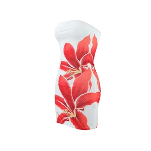 Detail of white tube dress featuring vibrant red lily floral prints and a slim bodycon fit