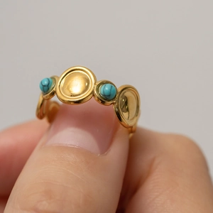 Retro turquoise stainless steel open ring with circular embossed gold finish for women