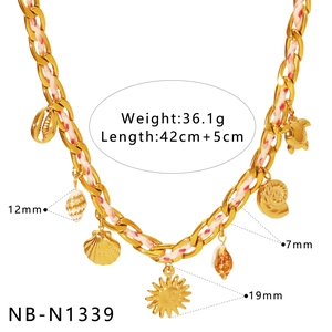 Detailed view of colorful cord necklace with seashell and sea turtle charms