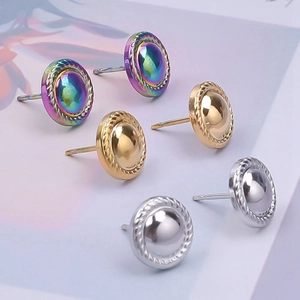 Detailed view of round 304 stainless steel stud earrings in gold, silver, and iridescent colors