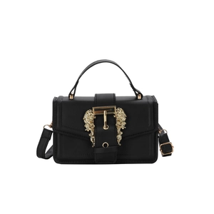 Chic black leather handbag for women featuring a large gold baroque buckle and top handle