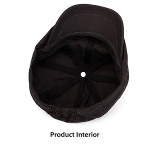 Internal view of cotton newsboy cap showing stitching and elastic band detail