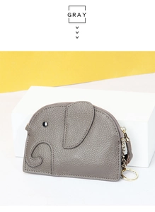 Detail of grey elephant-shaped genuine leather coin purse with silver rivet eyes