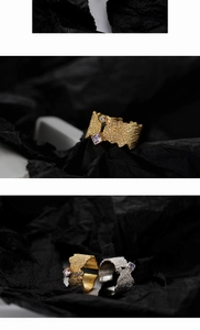 Detail of S925 sterling silver ring with unique texture and square purple gemstone