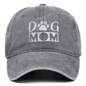Detailed view of the white DOG MOM embroidery with dog paw print on gray washed cotton cap