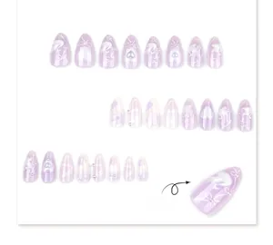 Detailed view of lavender almond press-on nails with 3D bows, hearts, and white pearls