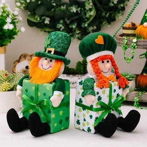 Detail of St. Patrick's Day gnomes with green clover gift box base and orange beard