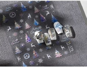 Macro view of TL-276 Christmas nail art decals with iridescent reindeer and snowflake patterns