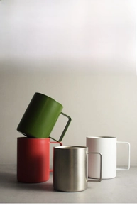 Modern 316 stainless steel mugs in four matte colors with ergonomic square handles