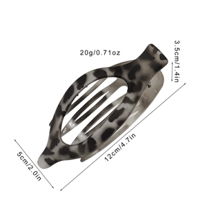 Minimalist leopard print oval hair claw clip with size measurements 12cm in length