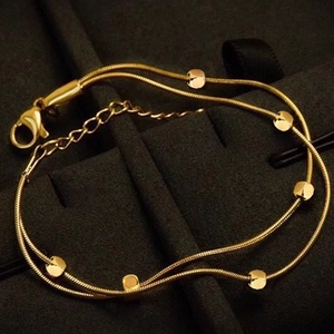 Double-layered gold stainless steel snake chain bracelet with faceted geometric beads