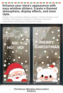 Detail of Santa and white bear Christmas window stickers on glass double doors
