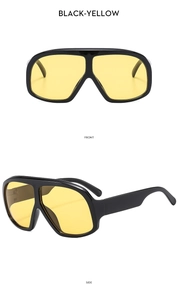 Front and side views of black oversized sunglasses with vibrant yellow lenses