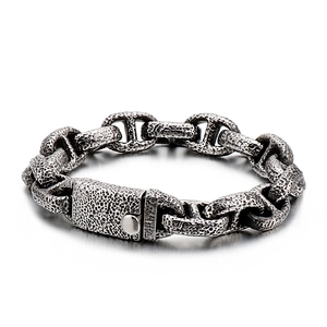 Heavy industrial vintage stainless steel men's bracelet with hammered lava texture finish