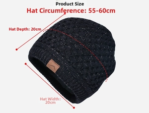 Close-up of black knit beanie with shiny white fibers, sport leather patch, and dimensions
