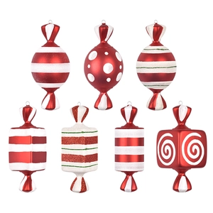Red and white festive candy Christmas ornaments in various shapes with glitter finish