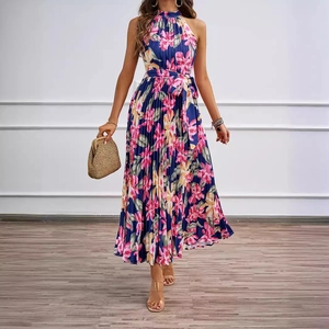 Elegant floral halter maxi dress with pleated fabric and waist belt for summer