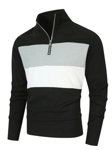 Détail d'un sweat-shirt à quart de zip pour homme avec un motif classique à blocs de couleurs