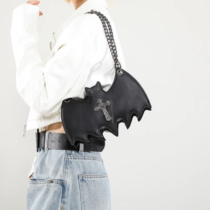 Gothic bat-shaped black leather shoulder bag with metal cross and chain strap details