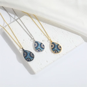 Minimalist evil eye teardrop pendant necklace in gold, silver, and black finish with zircon