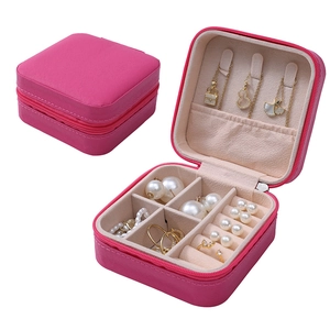 Portable pink PU leather jewelry travel case with compartments for rings and necklaces