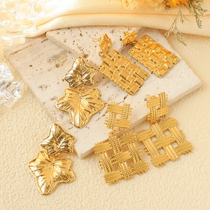Three pairs of vintage gold woven titanium steel earrings with retro geometric designs
