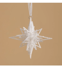Detail of white glitter 3D star Christmas ornament with silver hanging ribbon and sparkles