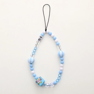 Handmade beaded phone strap with cartoon bear and blue cube beads on white background