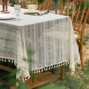 Vintage beige lace tablecloth with floral patterns and tassels for wedding decor