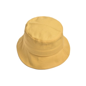 Detailed close-up of yellow cotton bucket hat showing parallel stitching on the brim