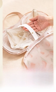 Detail of thickened elastic band inside tulip laundry bag for bra protection