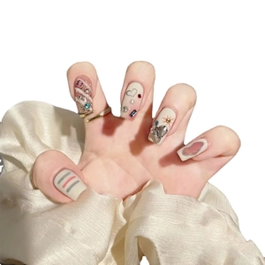 Cream white press-on nails with plaid patterns, colorful rhinestones and 3D heart charms