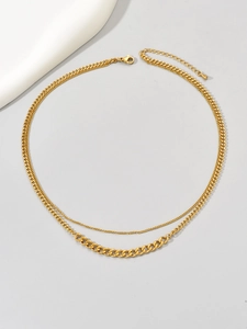 Detailed close-up of a double-layered gold-plated stainless steel curb chain necklace
