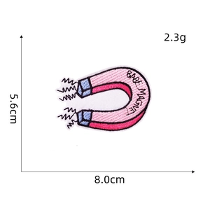 Detail showing embroidered Babe Magnet patch with clear dimensions 8.0cm x 5.6cm