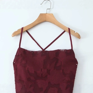 Slim fit burgundy off-shoulder dress with floral textured fabric and tie-back design