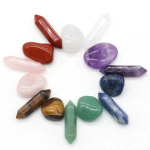 Healing crystal set with hexagonal columns and irregular stones in a circular arrangement