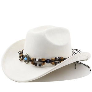 Detail of white suede cowboy hat with turquoise bead band and woven tassel trim