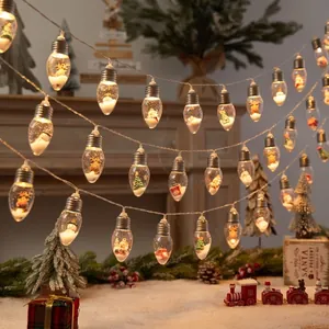 LED Christmas wish bottle string lights with Santa and snowman figurines inside bulbs