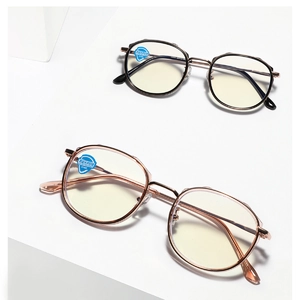 Occhiali rotondi TR90 anti-luce blu con protezione UV400 in oro rosa e metallo nero