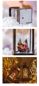 Detailed view of bronze Christmas lantern with Santa figurines and bottom battery compartment