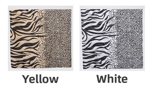 Detail showing leopard and zebra print patchwork patterns on smooth silk scarf fabric