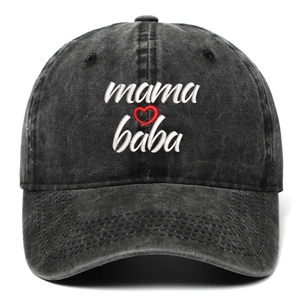 Detail of mama baba embroidery and heart on washed black vintage baseball cap